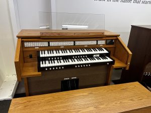 Allen G100 – This organ includes 35 stops with GENISYS™ Voices, Allen’s LED tab stop controls, two-manuals of industry standard keyboards, 32-note parallel pedalboard, golden oak console finish, GeniSys™ Display, GeniSys™ Voices, two-channels of internal and external audio, standard bench, and headphone jack. Contact Sandrock Music Company for more information and pricing.