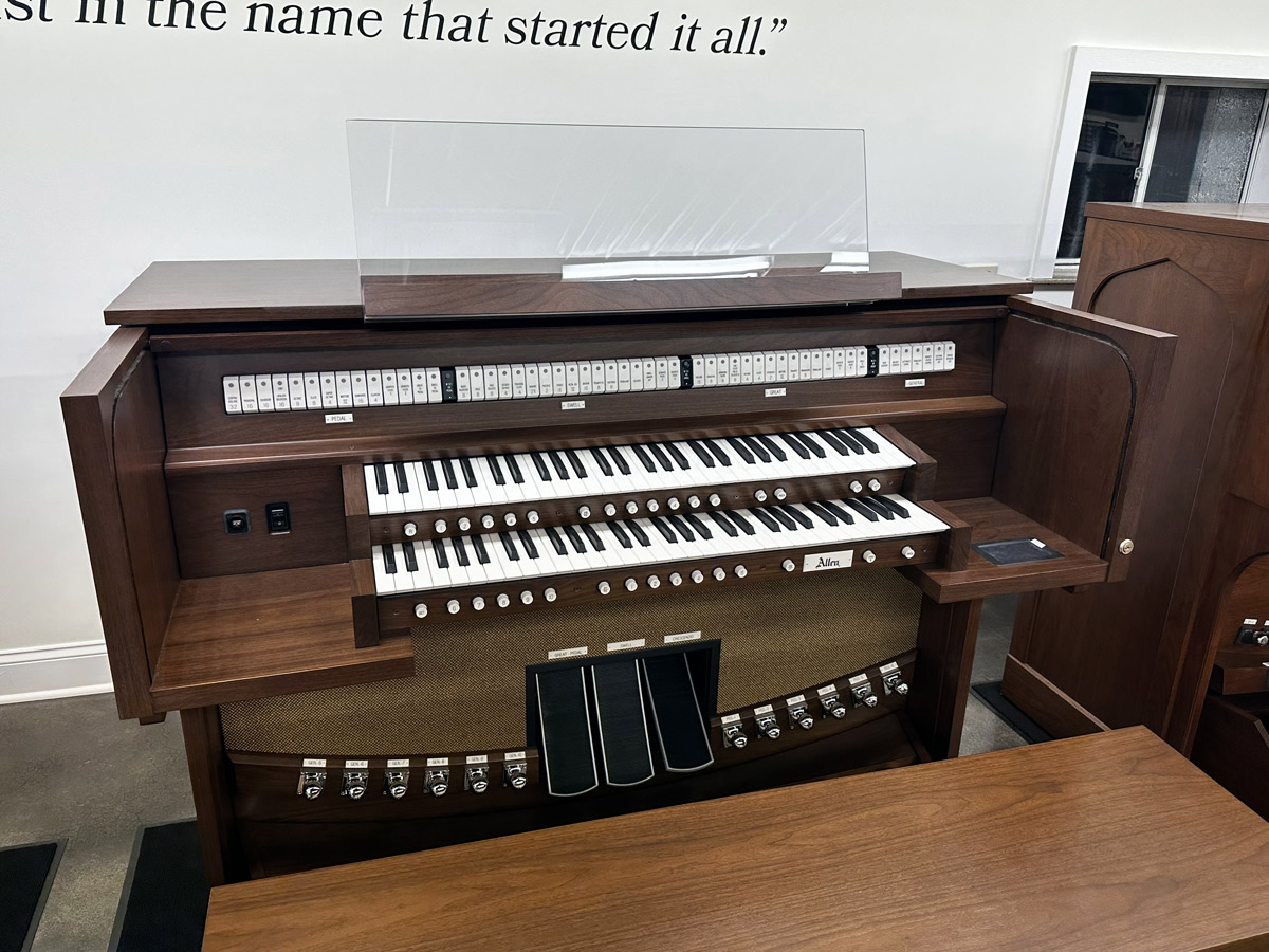 Allen GX-215 – Features include 34 stops, two-manuals of Allen premium keyboards, efficient LED tab stop controls, GENISYS™ Display, 32-note AGO pedalboard, illuminated clear acrylic music rack and pedal light, GENISYS™ Remote, Hymn-Player™, Performance Player™, recording and playback capabilities, Allen’s new APEX Technology, standard lift-lid bench with storage area and custom audio.  Contact Sandrock Music Company for more information and pricing.