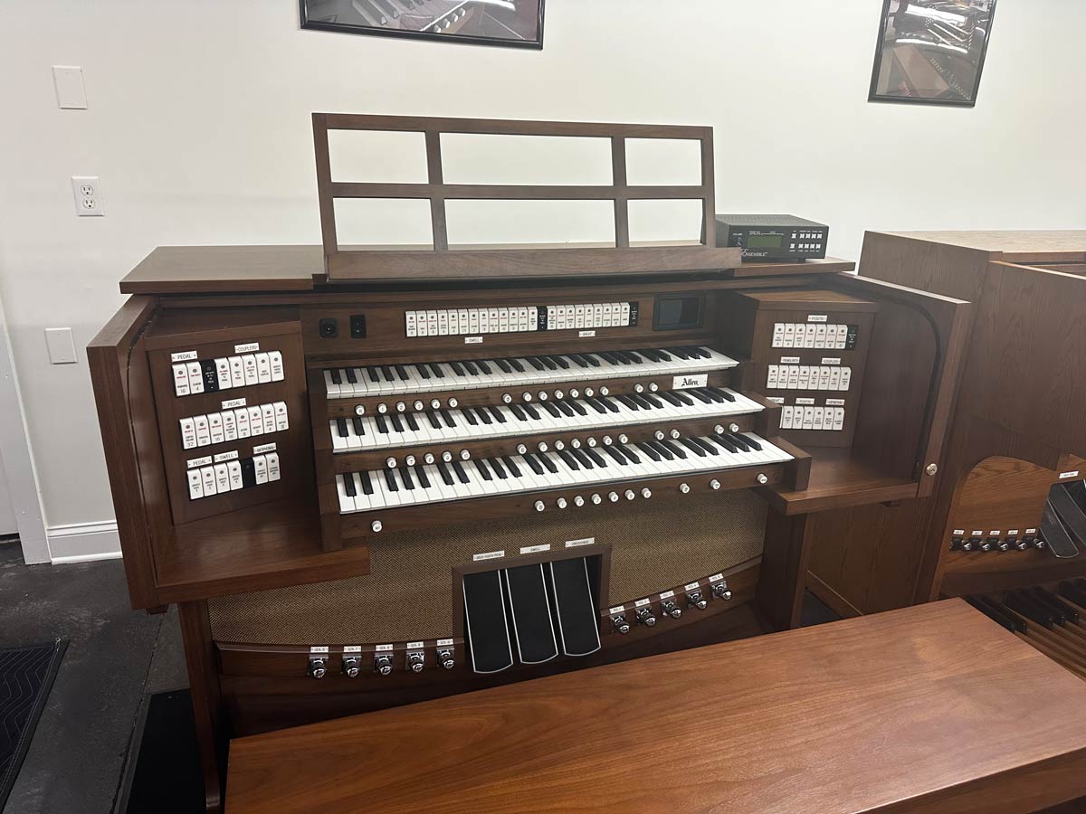 Allen G330 {manufactured in 2019} – This Two-Piece console features 46 Stops with GENISYS Voices, Three-Manuals of Allen’s premium keyboards with reed-switch contacts and velocity keying, 32-note AGO pedalboard, tab stop console with dark-walnut finish. Expression includes Great-Pedal, Swell and Crescendo. MIDI Ensemble, GENISYS Display, GENISYS Remote, Hymn-Player and Performance Player, illuminated lattice wood music rack, pedal light, locking rolltop, lift-lid bench with storage area and bench blocks, four-channels of internal and external audio and four furniture grade speaker cabinets with brown grill cloth. Also has 3 Theatre suites with stops engraved in red. This organ is in mint condition! Contact Sandrock Music Company for more information and pricing.